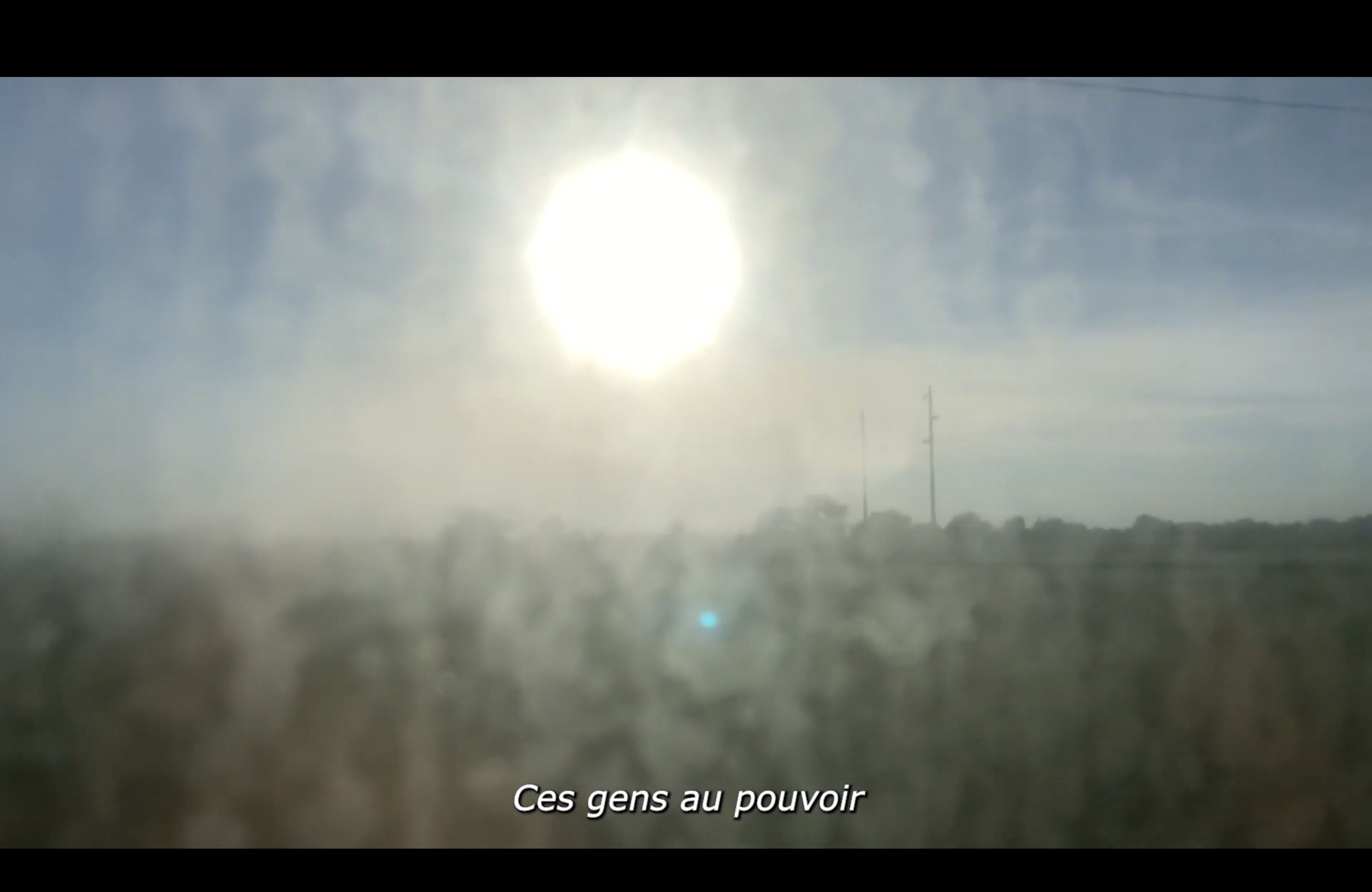 film still of early morning sun, with text laid over